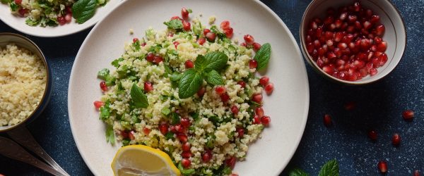Bejeweled Couscous Salad Bejeweled Couscous Salad on Table With Lemon