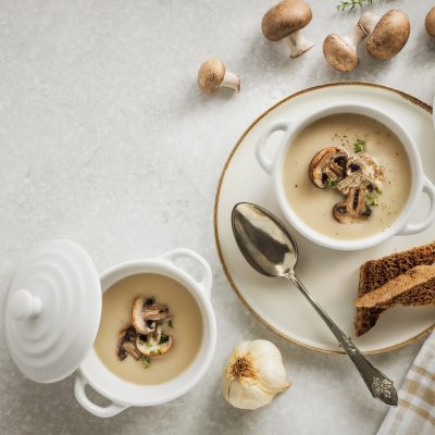 Roasted Cauliflower Soup With Mushrooms on White Background