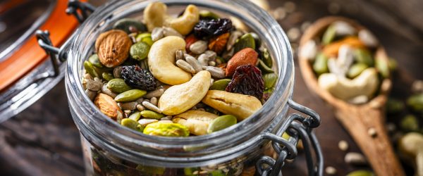 Big Batch Trail Mix in Glass Jar With Spoon