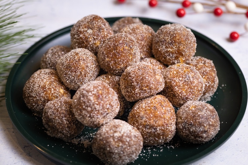 A Plate is Piled High With Sugar Plums Wrapped in Sugar and Made Using a Gluten-Free Sugar Plum Recipe.