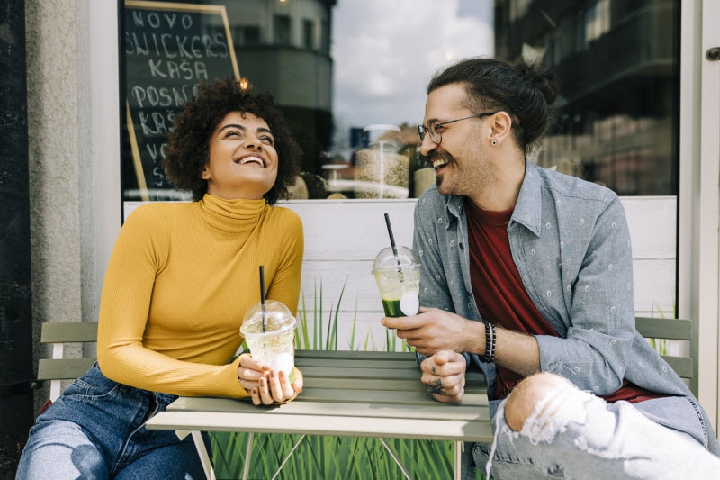 Staying Sober - Your Guide to Success After Dry January Couple Planning on Staying Sober After Dry January Enjoying Green Drinks at an Outdoor Cafe