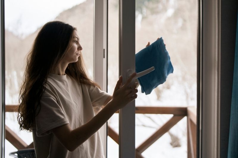 Woman With Cloth Winter Cleaning