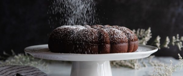 A Chocolate Olive Oil Bundt Cake is Sprinkled With Powdered Sugar.