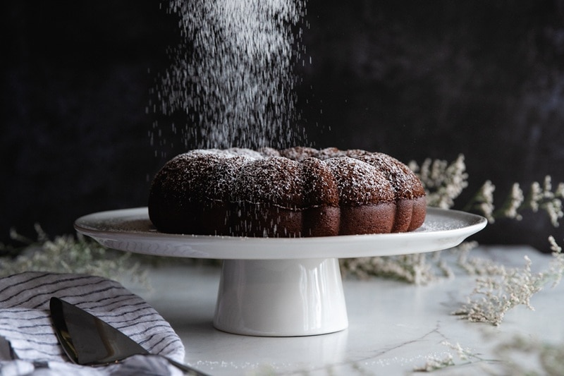 A Chocolate Olive Oil Bundt Cake is Sprinkled With Powdered Sugar.