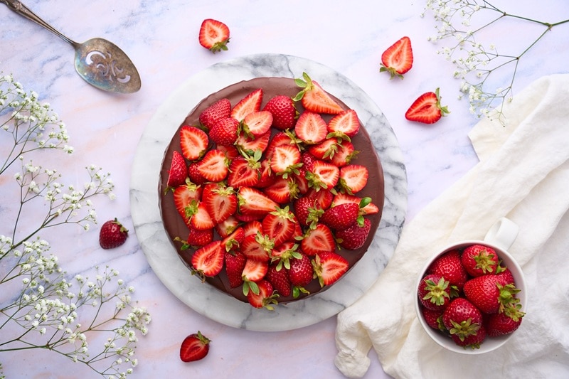 An Overhead View of a Chocolate Strawberry Cheesecake.