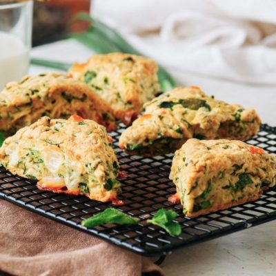 Savory Scones With Broccoli, Cheese & Tomato on a Cooling Rack