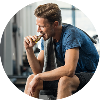 man eating snack bar