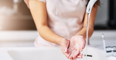 woman washing hands