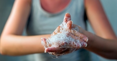 person washing hands