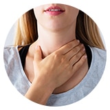 image of woman holding her neck